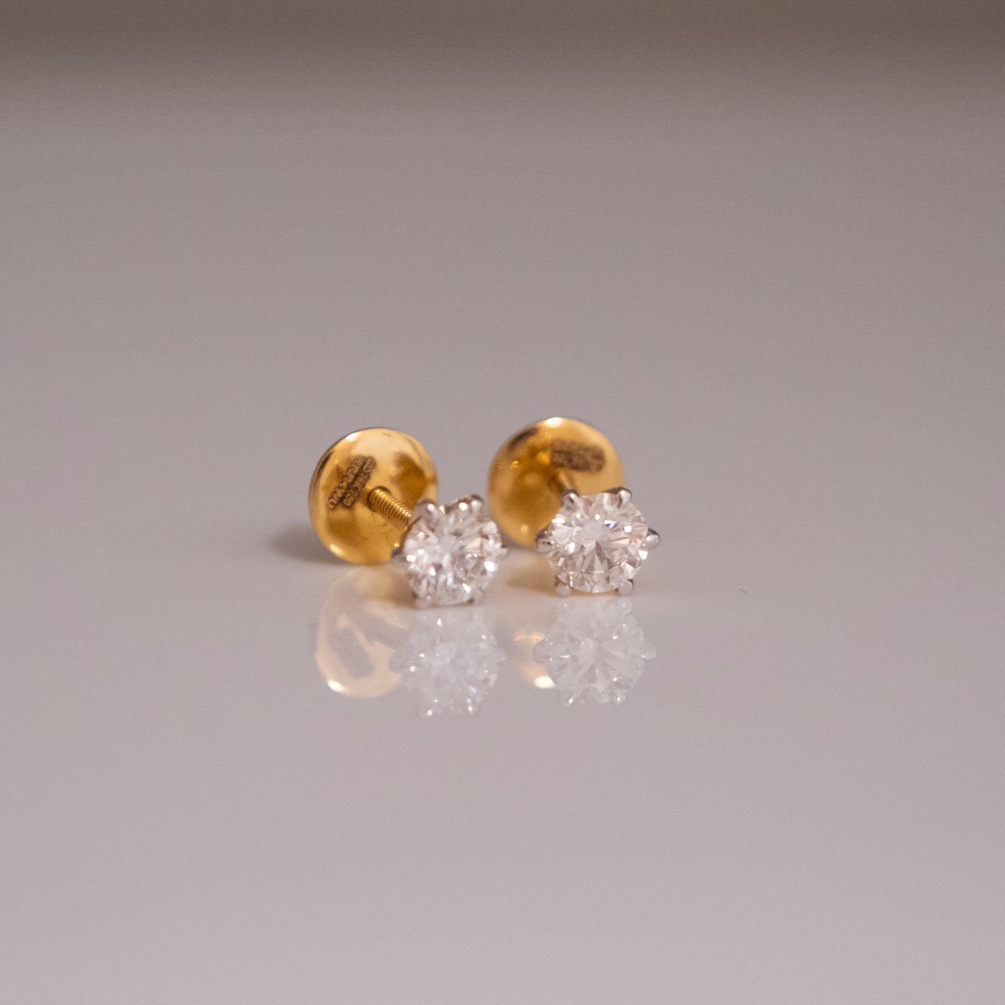 0.5-0.5ct Round Solitaire Earrings