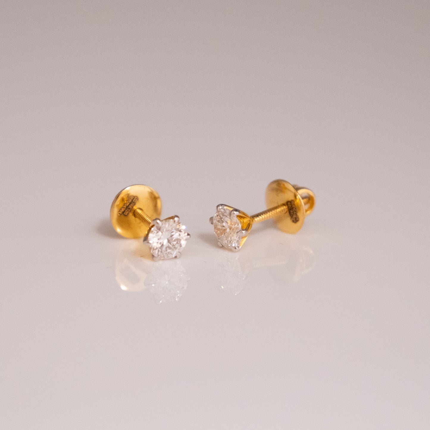 0.5-0.5ct Round Solitaire Earrings